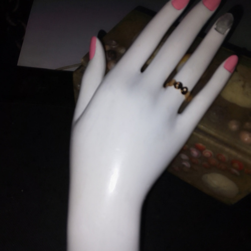 gold curly shaped ring