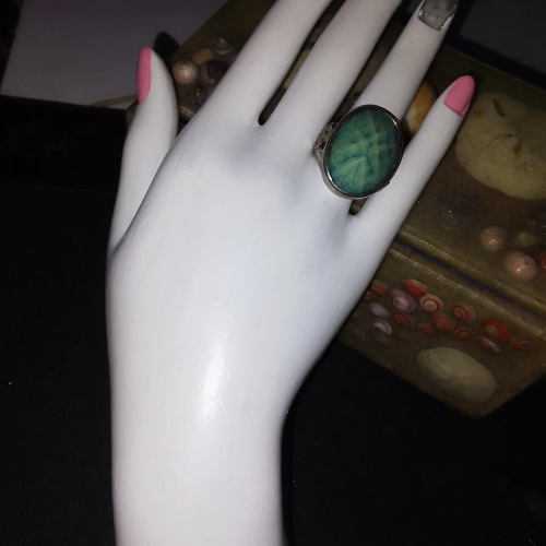 silver mint green oval shaped ring
